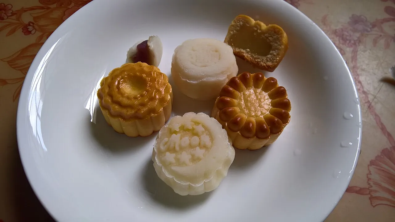A plate of mooncakes in different flavours